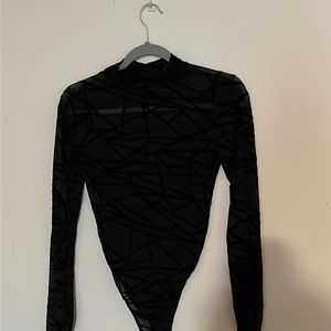 Sheer turtleneck bodysuit